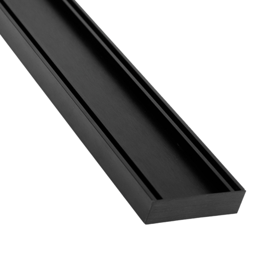 Slimline black aluminium tile insert grate for seamless wet area drainage. UV-stable, cuttable onsite, fits 11mm tiles ove...