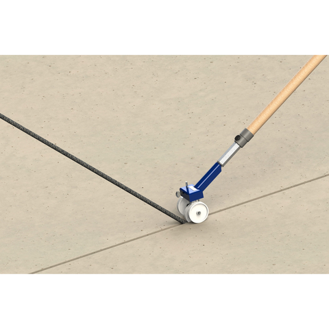 Albion 640-4 backer rod installer with broom handle rolls foam rod at precise depth into concrete joint for puncture-free ...