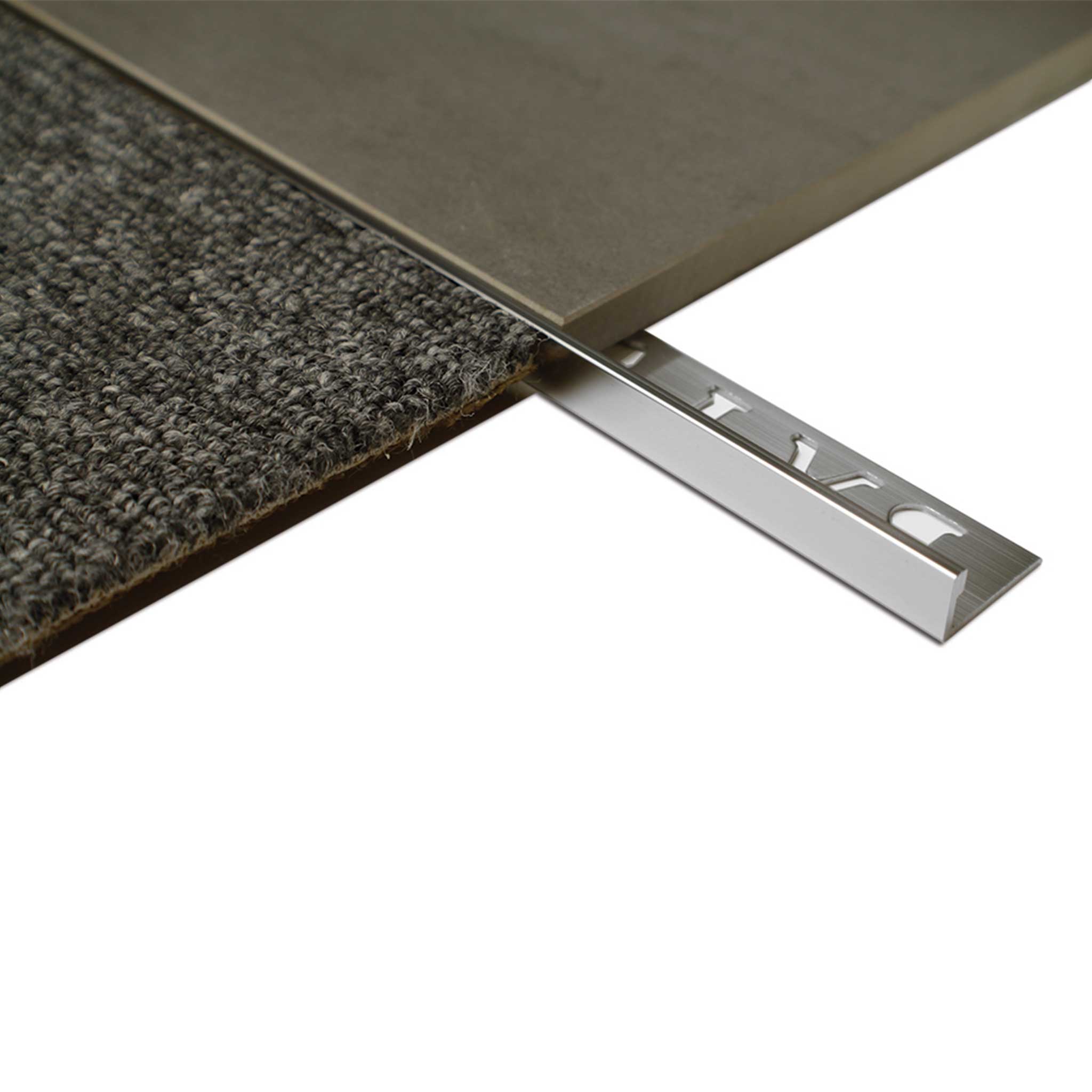 L-shaped perforated aluminium tile angle protects edges in showers/bathrooms, bonds via grout/adhesive for wet areas.