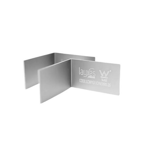 Lauxes 90° anodised aluminium waste corner joiner pair for seamless, rustproof grate turns in waterproofing drainage.
