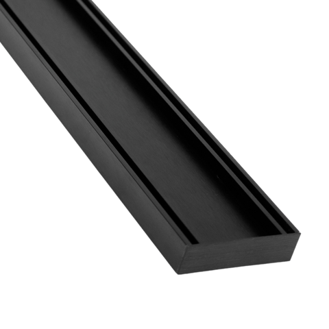 Slimline black aluminium tile insert grate for seamless wet area drainage. UV-stable, cuttable onsite, fits 11mm tiles ove...