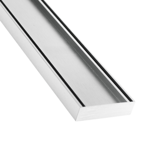 Slimline aluminium tile insert grate for seamless wet area drainage over waterproofing membranes; UV-stable, onsite cuttab...